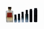Hand-decanted Maison Francis Kurkdjian Baccarat Rouge 540 sample bottles ranging from dark teal gradient glass minis to matte black travel atomisers by Perfume Direct London.